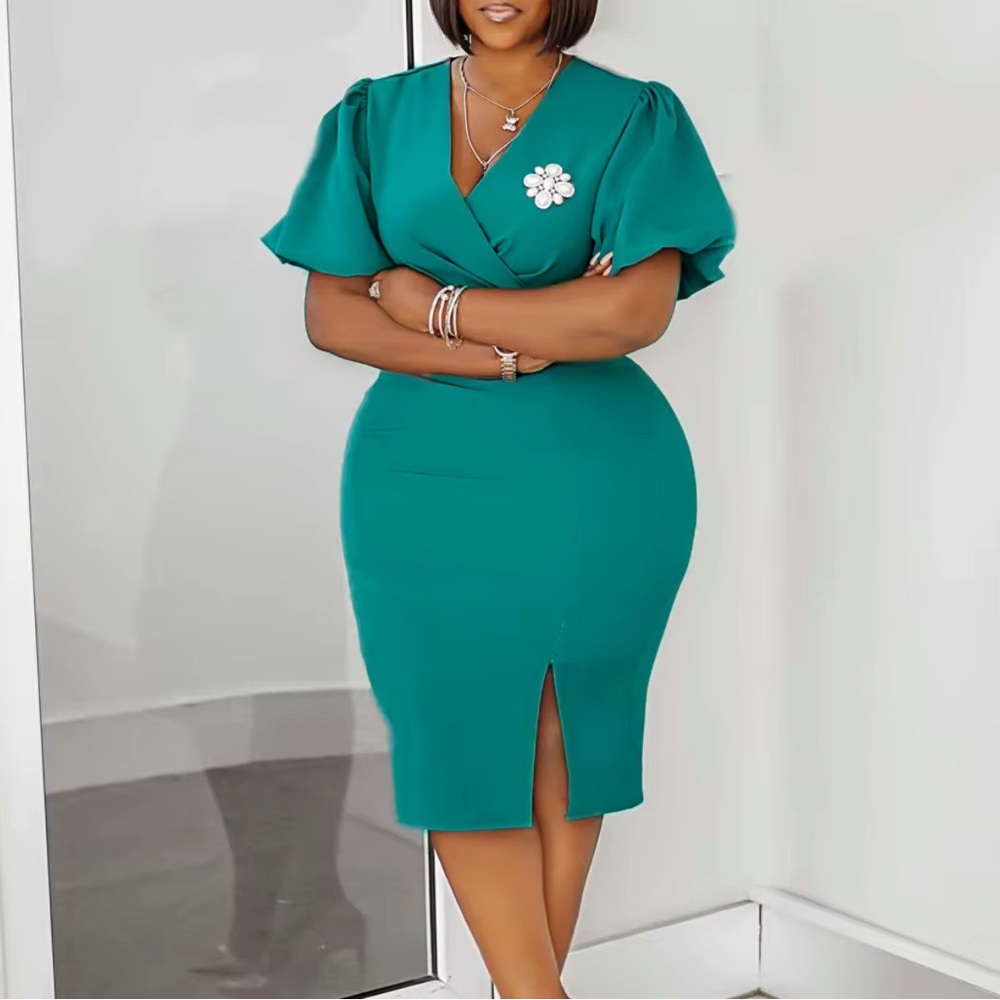 Elegant Teal Dress with Floral Brooch